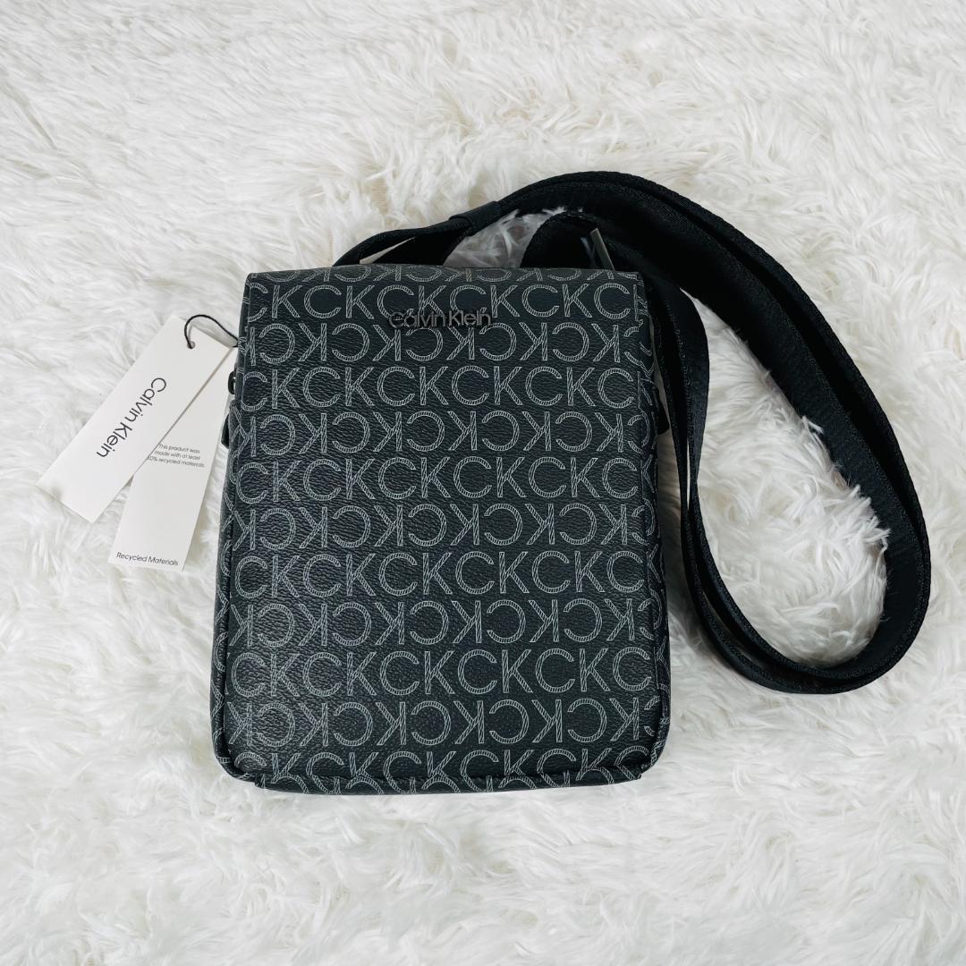 新品未使用 カルバンクライン クロスボディバッグ ショルダー 総柄 ブラック